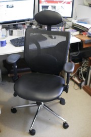An office chair sits at the heart of any business