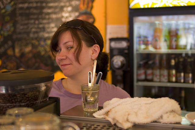 barista looking in the camera with a smile